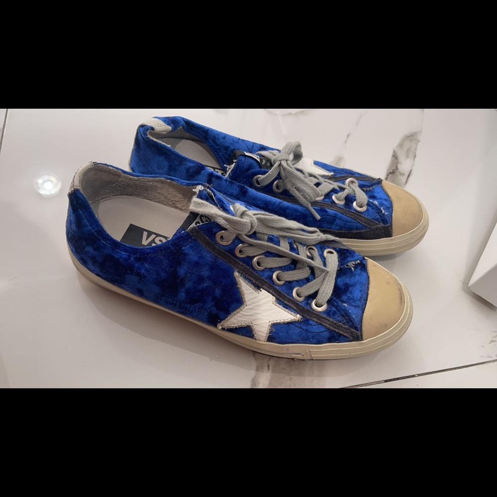 Golden goose sneakers.